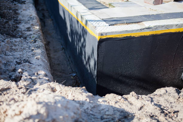 Professional Waterproofing technician working in Tecumseh, MI